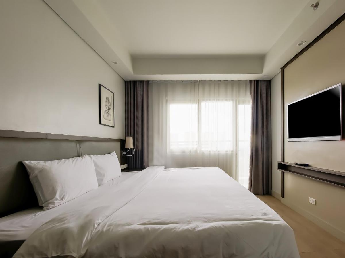 Capital O 804 The Residences At Bonifacio Civic Center Manila Eksteriør billede